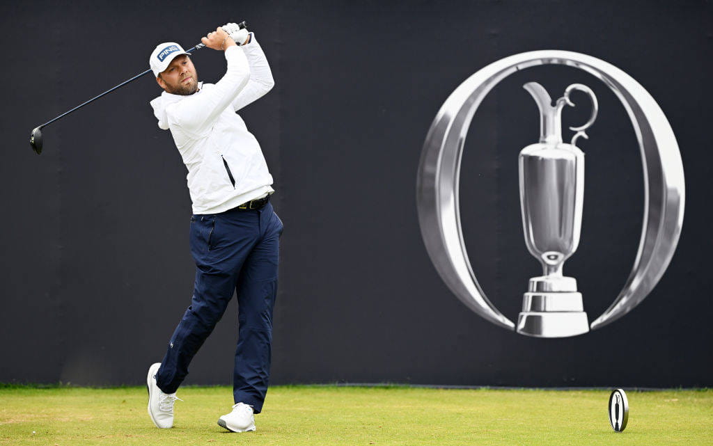 Daniel Brown of England tees off on the seventh hole on day one of The 152nd Open